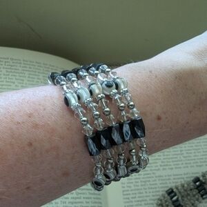 Pair Of Black and Silver Beaded Magnetic Bracelets